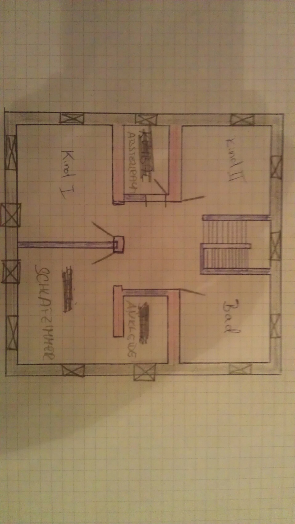 Hand-drawn floor plan of a house with rooms, stairs and bathroom.
