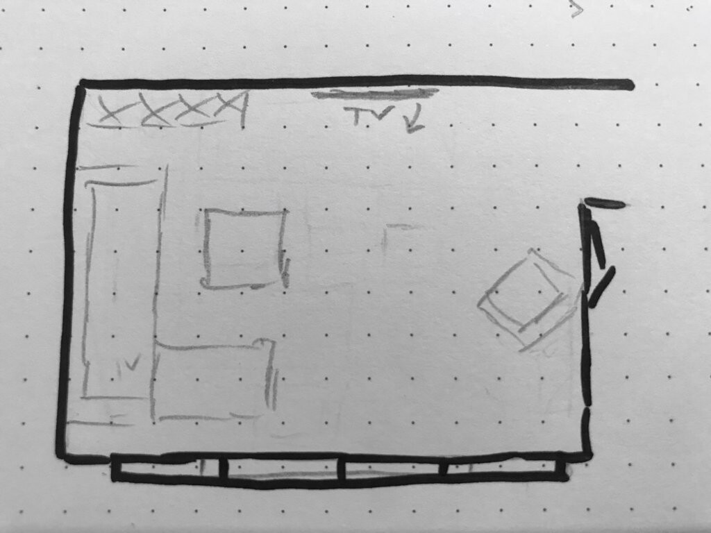 Skizze eines Wohnzimmer-Grundrisses mit Sofa und TV