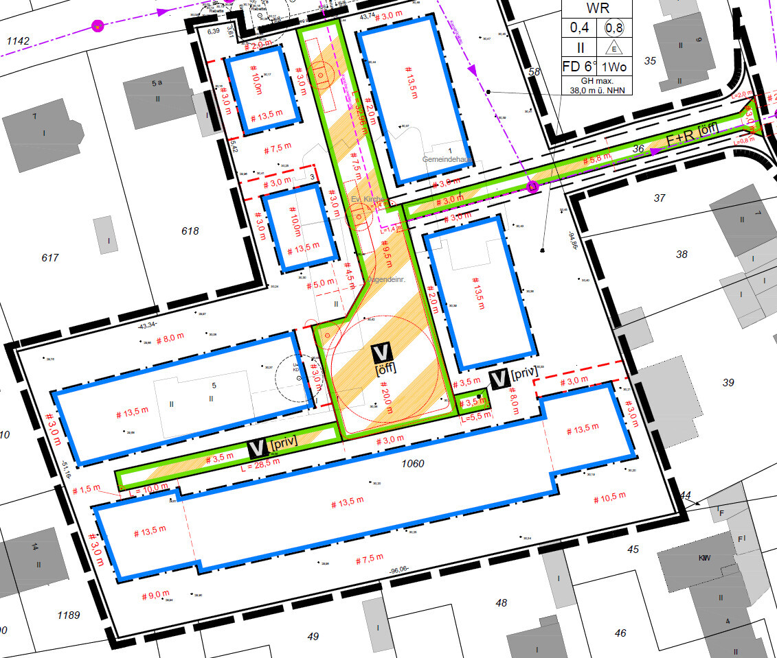 Site plan of a building complex with blue building areas, green spaces, and streets.