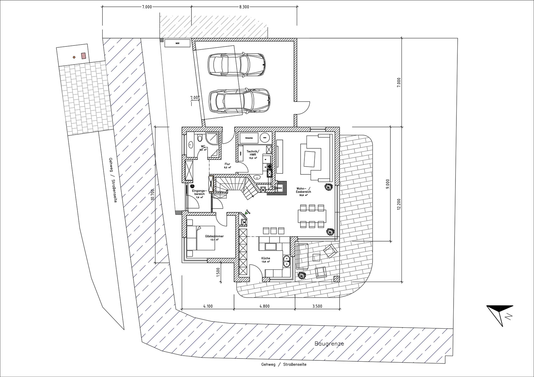 Floor plan of a single-family house with garage, living/dining area, kitchen, and guest room.