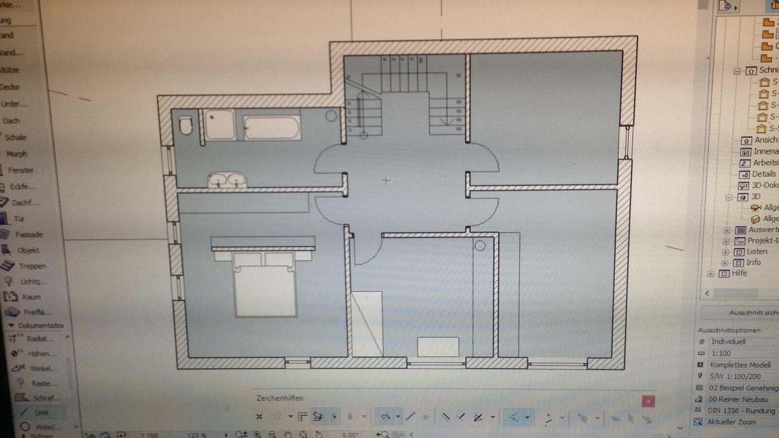 Floor plan of a residential house: central hallway with staircase, bathroom to the left, bedroom below, rooms to the right.