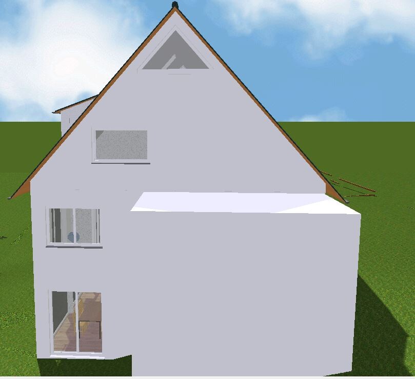 White, multi-story house with steep gabled roof and large windows on green lawn.