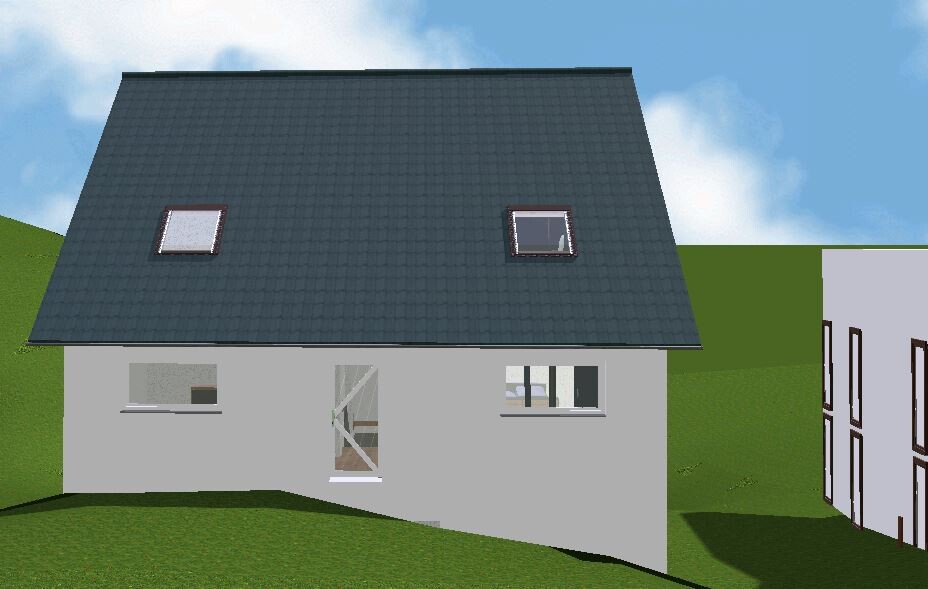 Residential building with gray facade, dark roof, two roof windows, door and side windows; green surroundings
