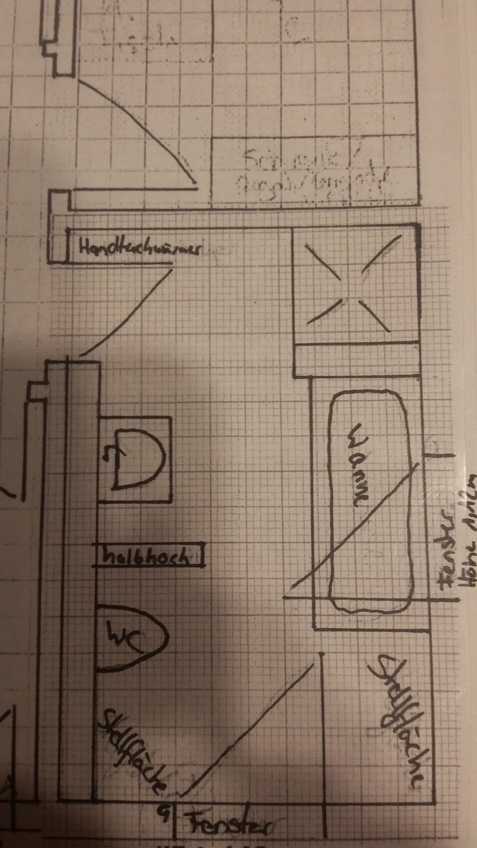 Hand-drawn bathroom floor plan sketch with shower, toilet, and sink.