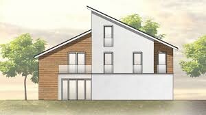 Modern two-story house with wood and plaster facade and sloping roof
