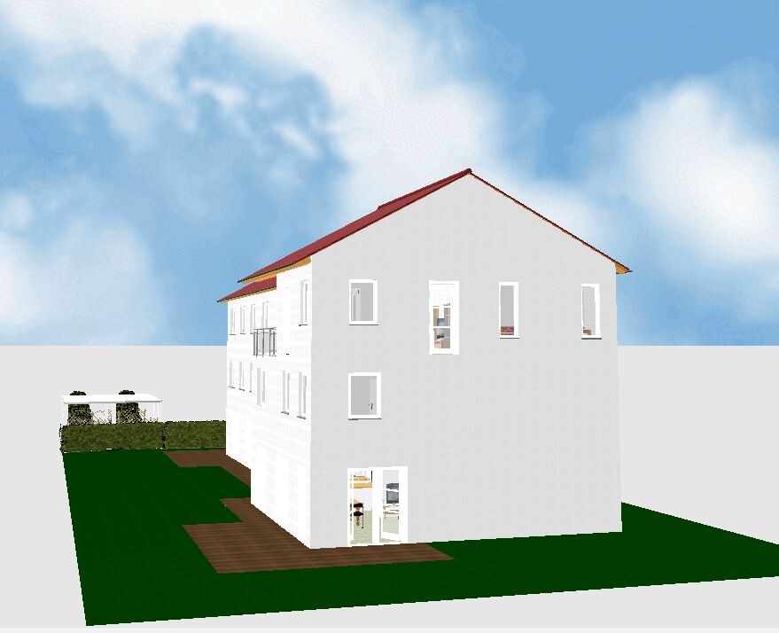 Multi-storey white house with red roof, wooden terrace, green lawn, blue sky.