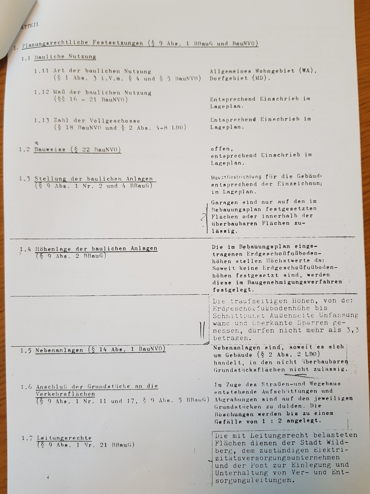 Black-and-white scan of a development plan document with planning regulations