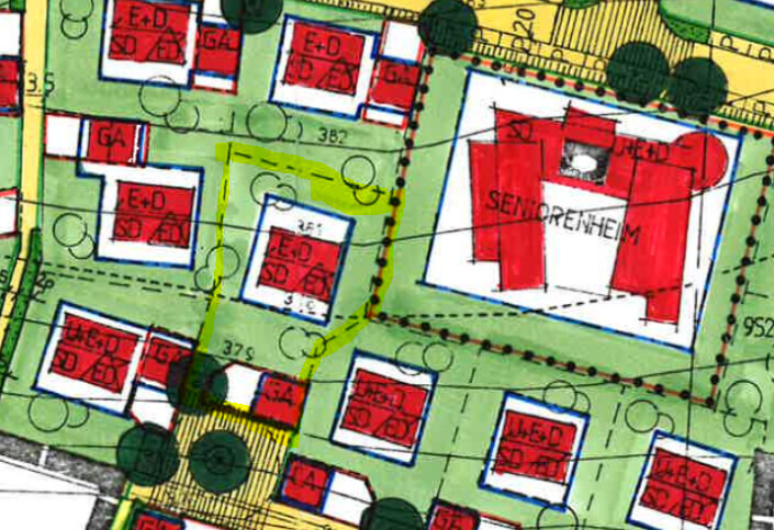 Lageplan einer Siedlung mit Gebäuden, Grünflächen und Wegen