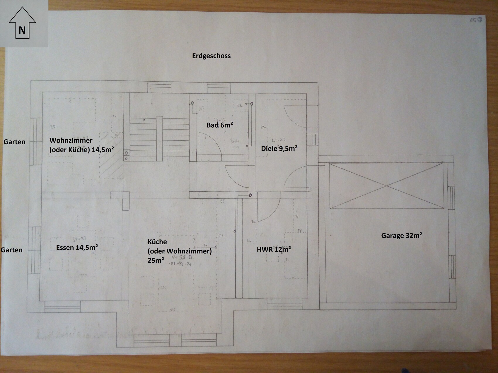 Ground floor plan of a house with living room, kitchen, bathroom, hallway, and garage.
