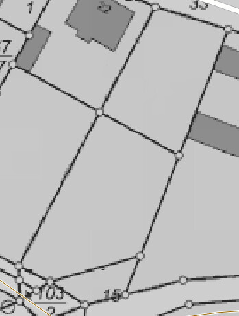 Site plan with parcels, floor plan lines, and plot boundaries.