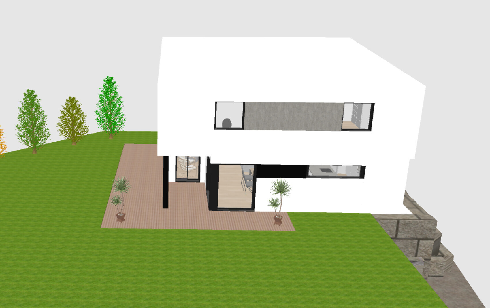 Modern white two-story house with large wooden terrace, green garden, and trees.