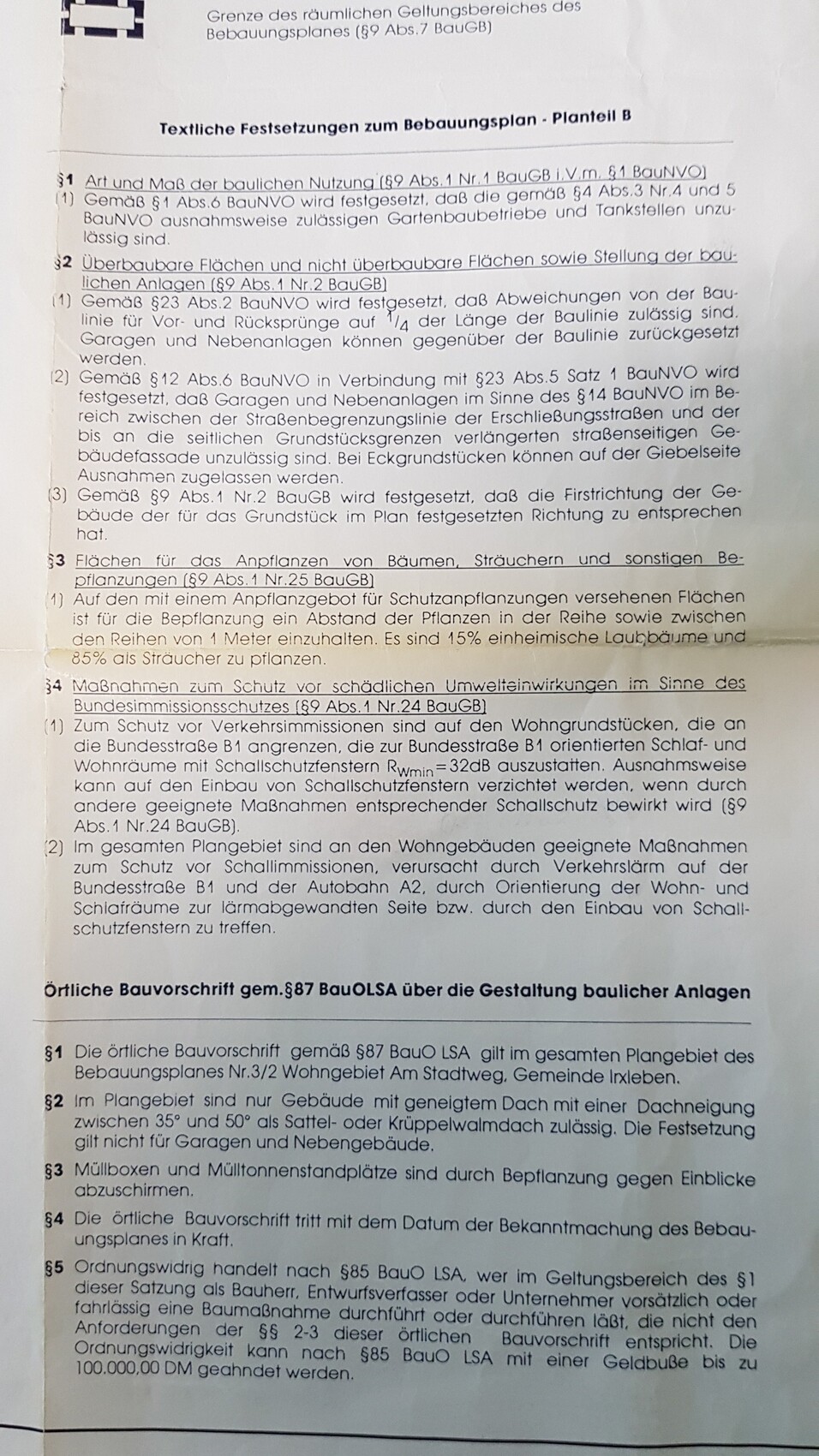 Page of a development plan with textual regulations and paragraphs.