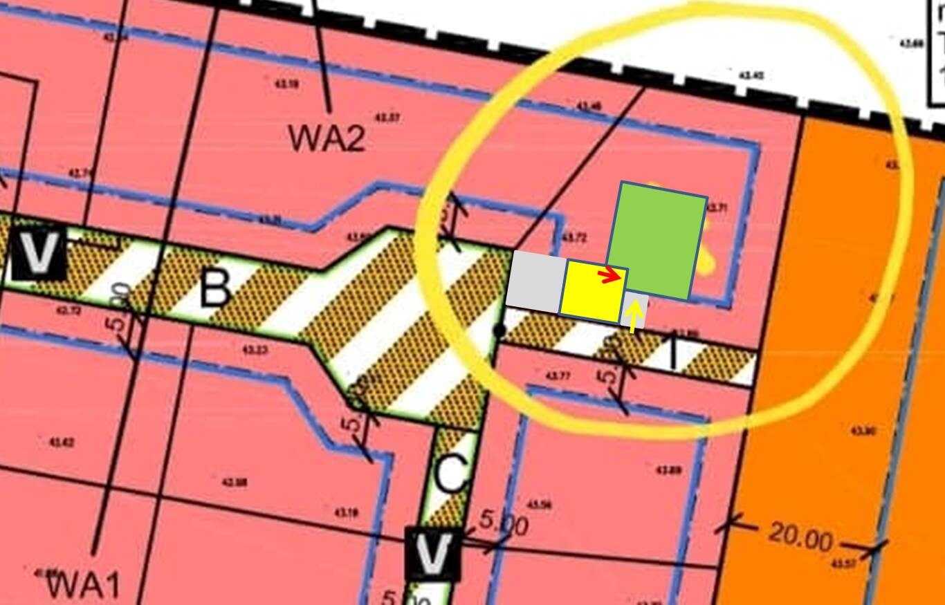 Zonenplan mit pinken Flächen WA2/V/B; gelber Kreis markiert graue, gelbe und grüne Rechtecke.