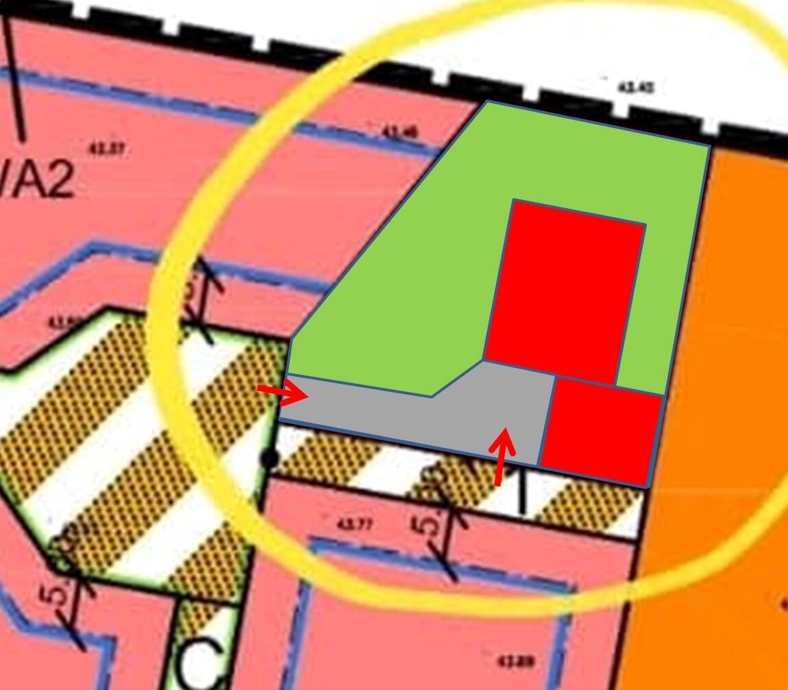 Floor plan sketch: green L-shaped area over gray zone, red rectangles, yellow circle marking.