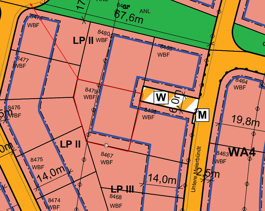 Site plan of a plot with parcels, building areas and road layout