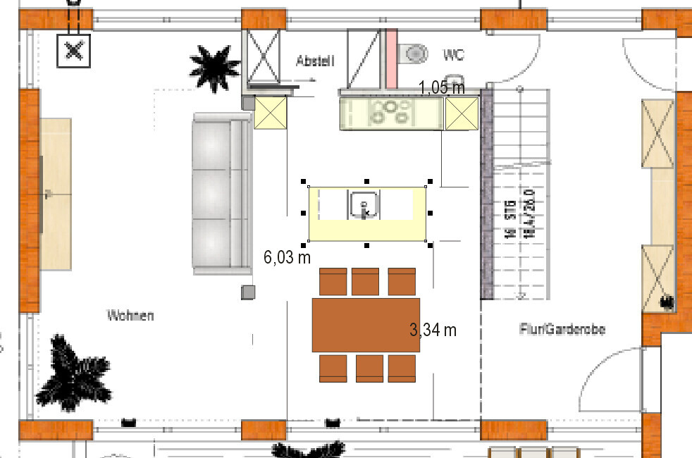 Open floor plan: living room with sofa, kitchen island, dining table, stairs, storage room, WC.