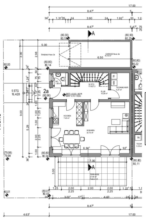 Floor plan of a house with kitchen, dining room, living room, terrace, and garage