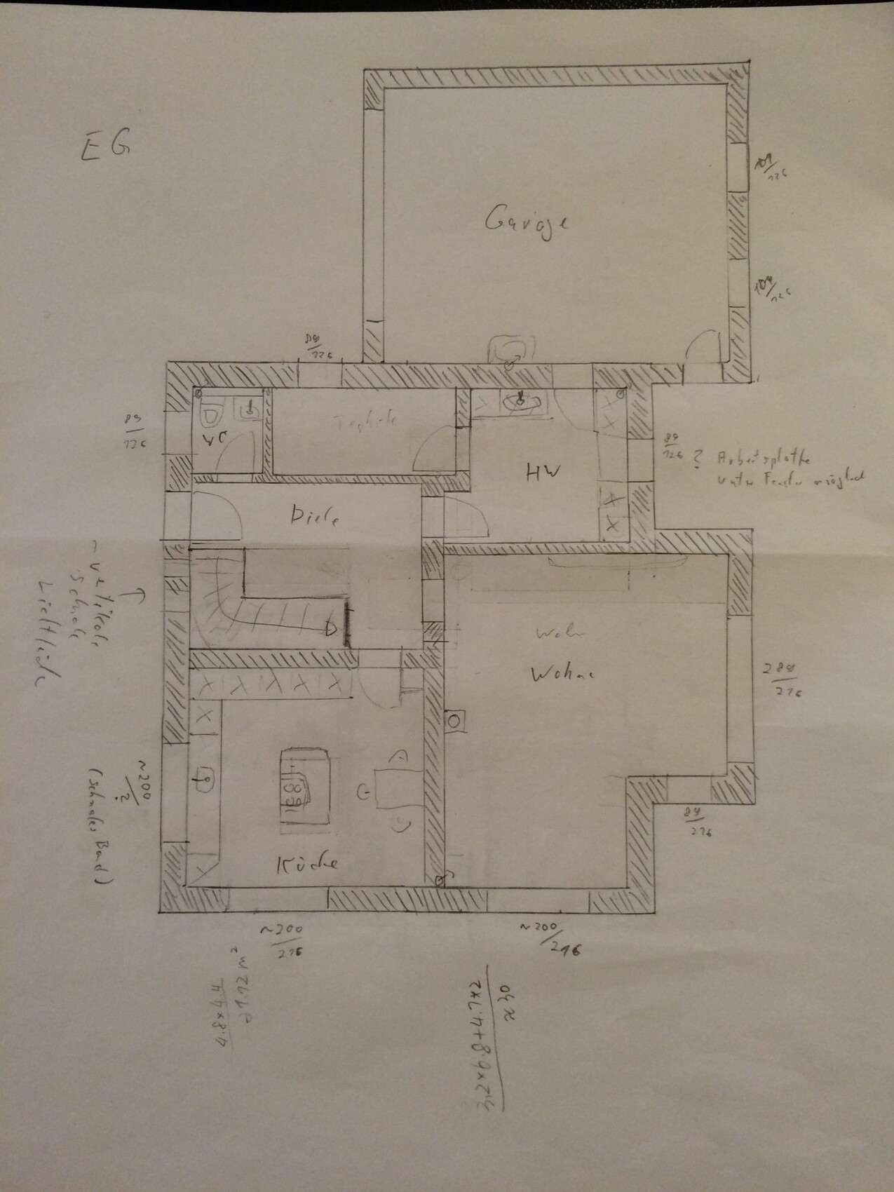 2D floor plan of a house with garage, kitchen, living room, and bathroom