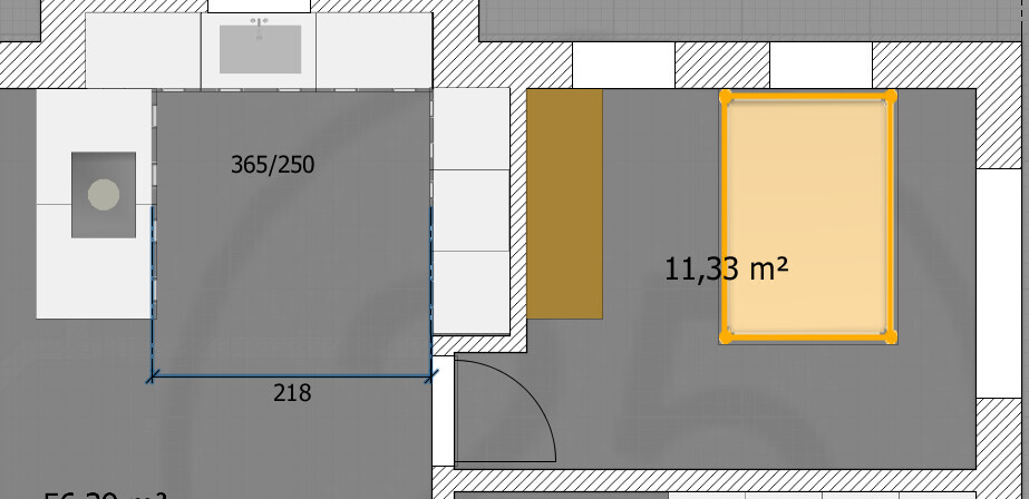 Floor plan of a room: left area with furniture block, right sleeping area with bed; door and 11.33 m² (122 sq ft).