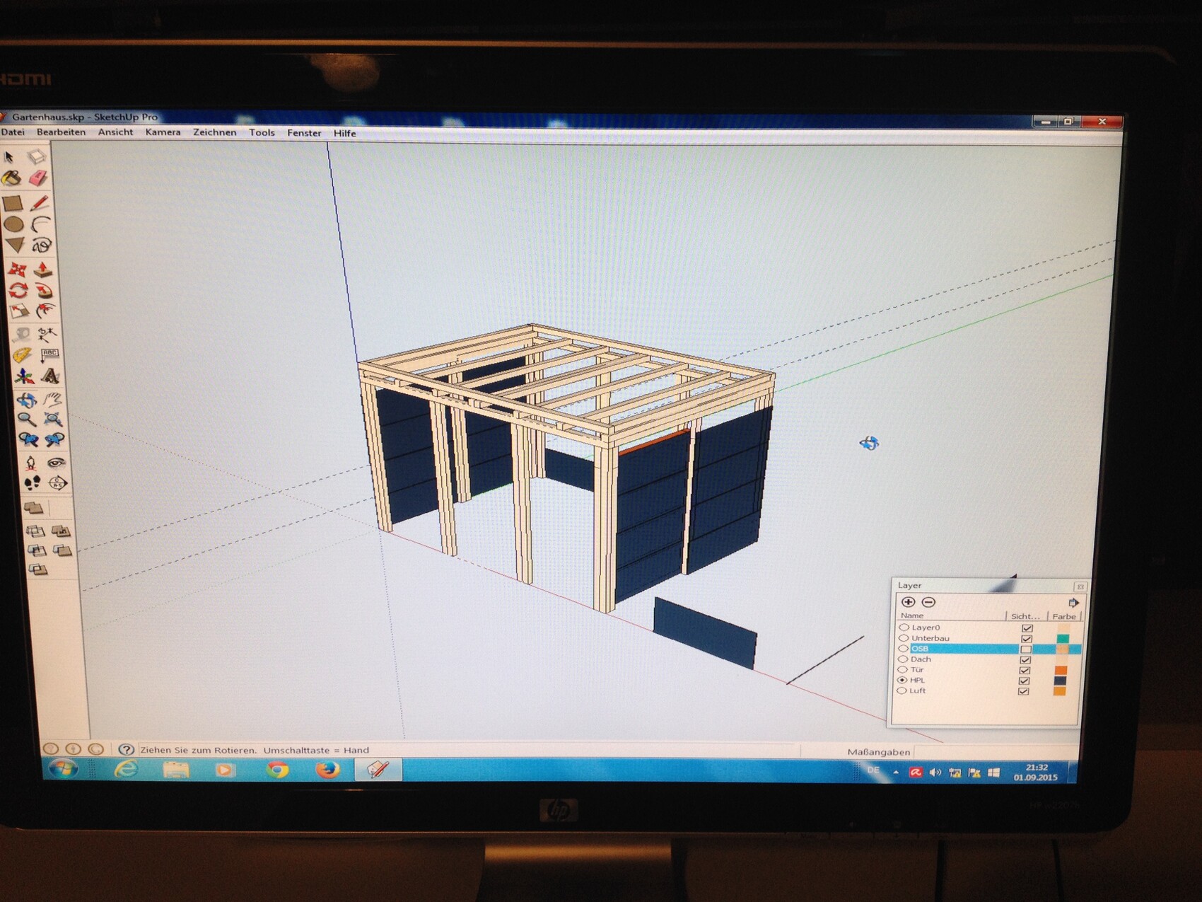 3D model of a timber frame building with blue wall cladding and roof structure (SketchUp)