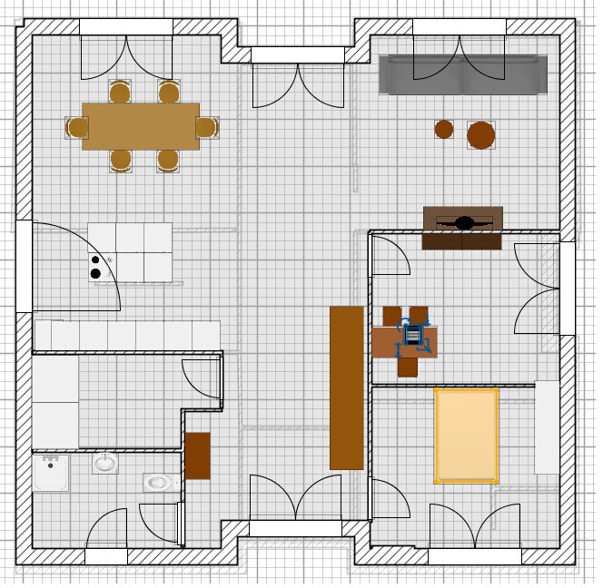 Floor plan of an apartment: dining table on the left, office and bedroom on the right, bathroom/kitchen bottom left