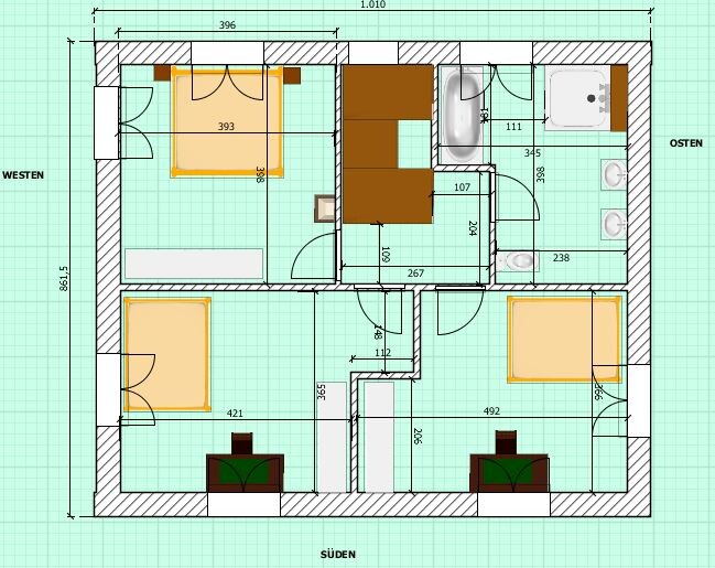 Floor plan of a house: rooms, kitchen with island, bathroom, hallway, and doors.
