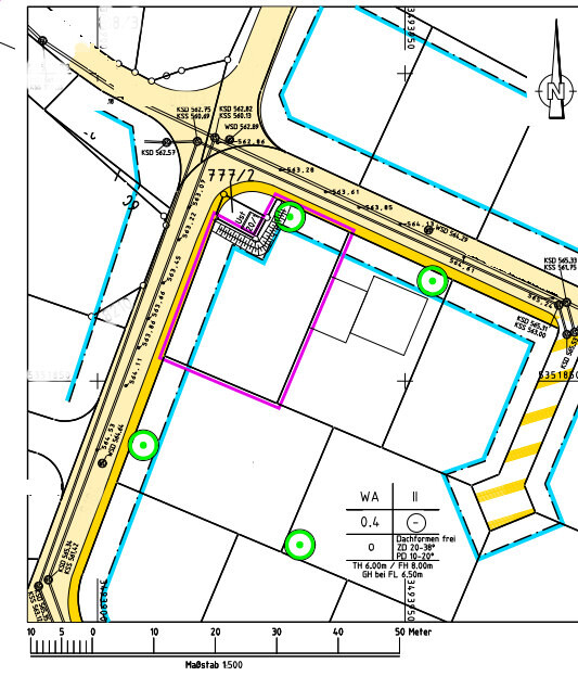 Site plan of a street intersection: blue property boundaries, pink building areas, yellow roads