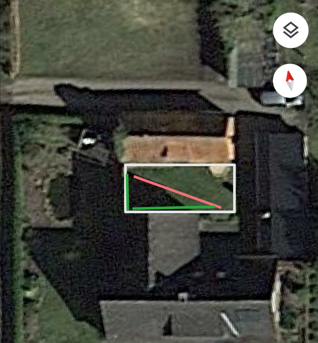 Satellite image of a house with marked rectangle in the yard, green baseline and red diagonal.