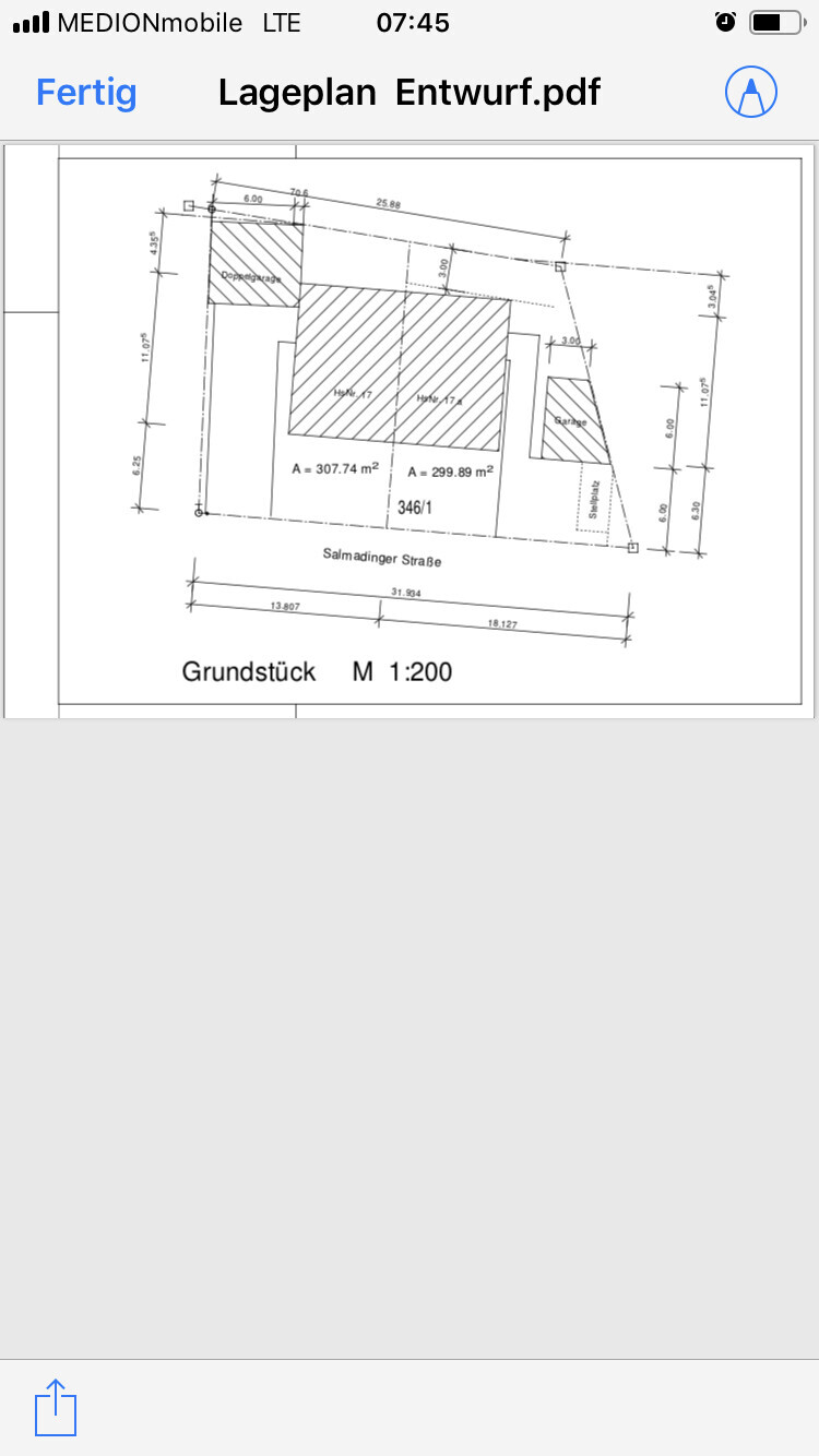 Site plan with three building parts, scale 1:200, street names visible.