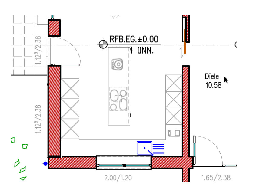 Floor plan of a room with red interior walls, furniture, doors, and dimensions.
