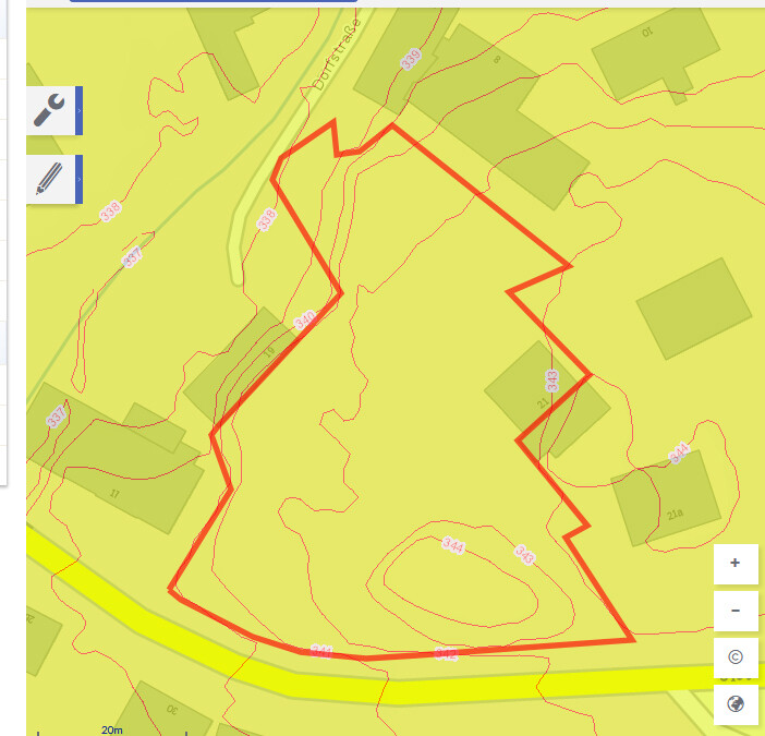 Map view with red parcel outline on yellow background, surrounding roads and buildings.