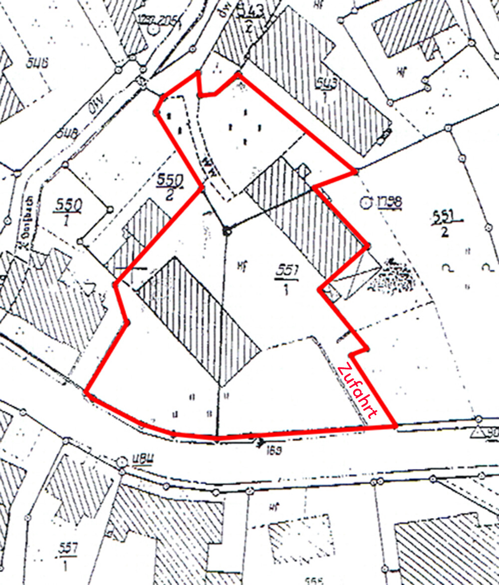 Site plan with red property boundary and access to the road.