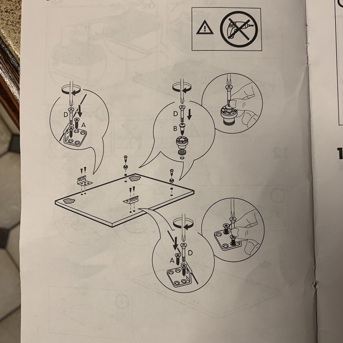 Black and white installation drawing with screws and assembly steps for furniture.