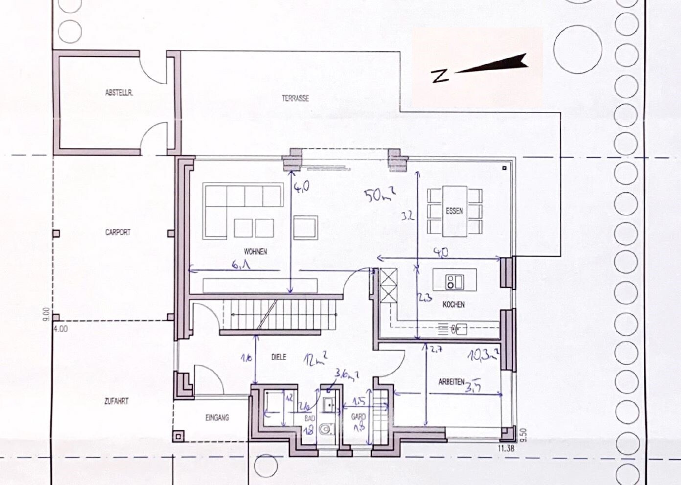 Floor plan of a house with living room, kitchen, dining area, terrace, entrance and carport