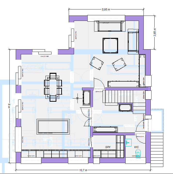 Floor plan of a house with living room, dining area, kitchen, stairs, WC, and furniture.