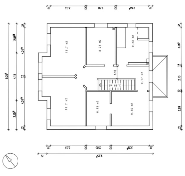 Floor plan of a residential house with multiple rooms, staircase and corridors.