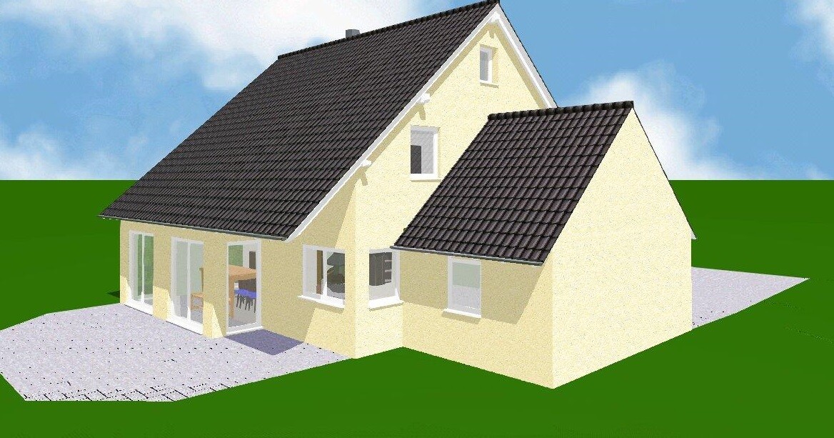 Yellow detached house with dark slate roof, glass front and terrace on green lawn.