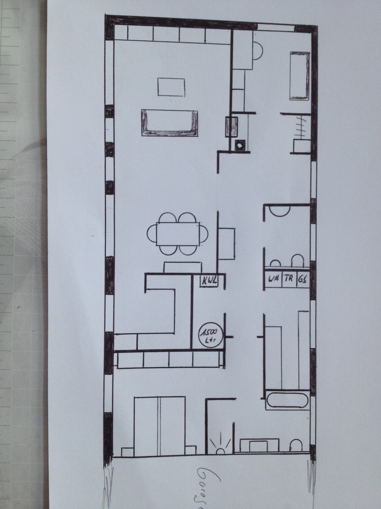 Hand-drawn floor plan of an apartment with living room, dining area, kitchen, bathroom, and bedroom.
