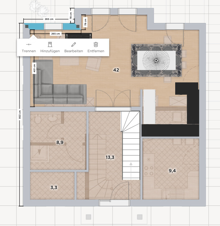 Floor plan of a residential house: open living area left, dining area right, kitchen bottom right, stairs in the middle.