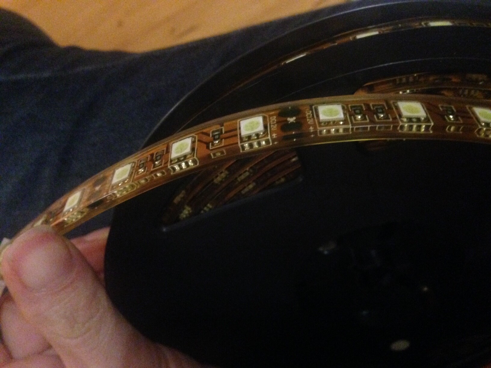 Close-up of a flexible LED strip with LEDs held by hand