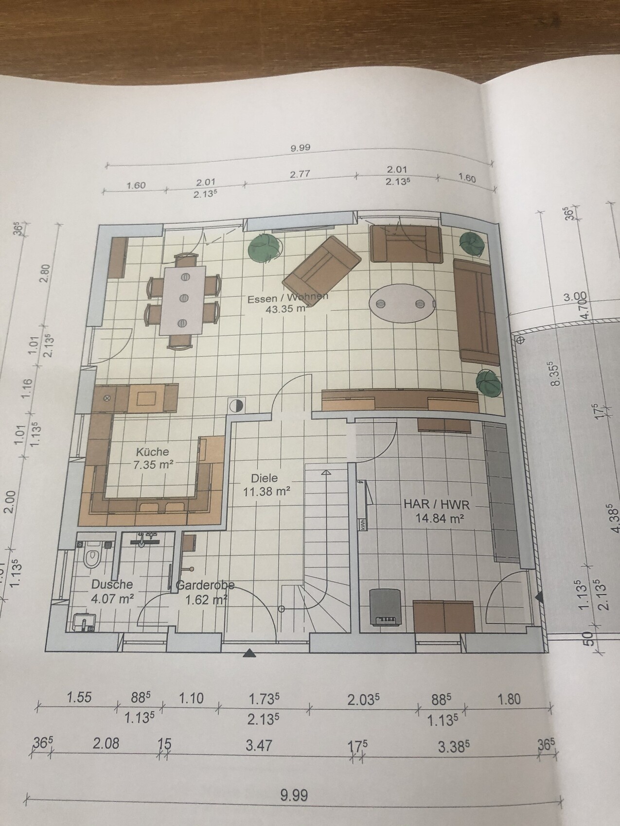 Floor plan of living/dining area with kitchen, hallway, utility/storage room, and shower