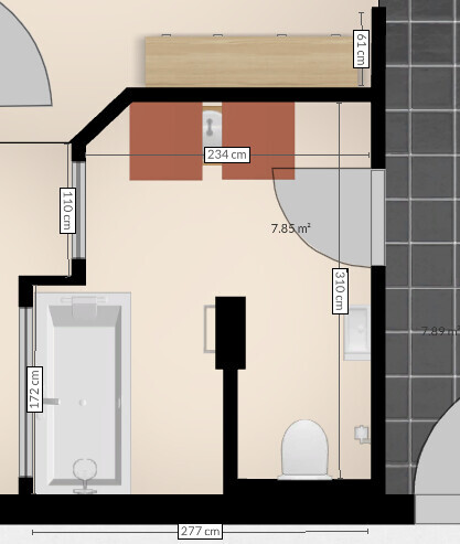 Floor plan of a bathroom with bathtub, toilet, washbasin and measurements