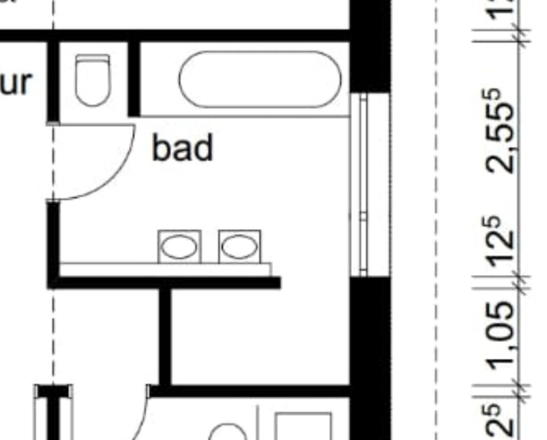 Floor plan of a bathroom with bathtub, toilet, double washbasin, and door.