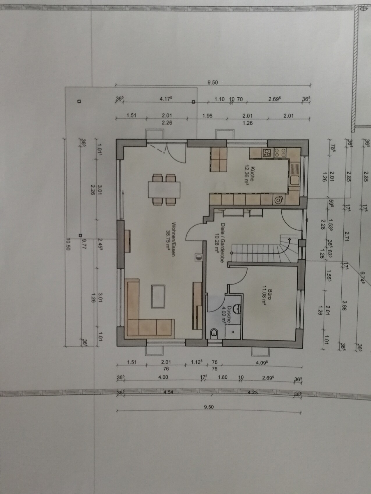 Floor plan of a house with kitchen, living room, entrance hall, bathroom and staircase.