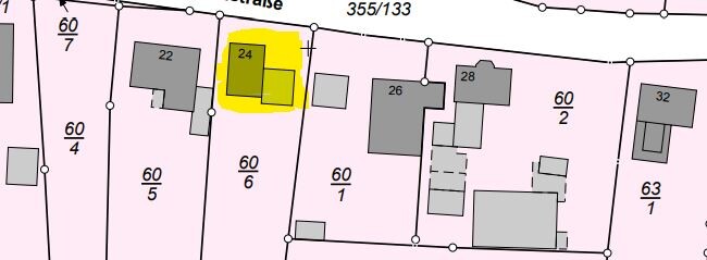 Cadastral map: plot 24 highlighted in yellow; neighboring plots 22 and 26, street at top.