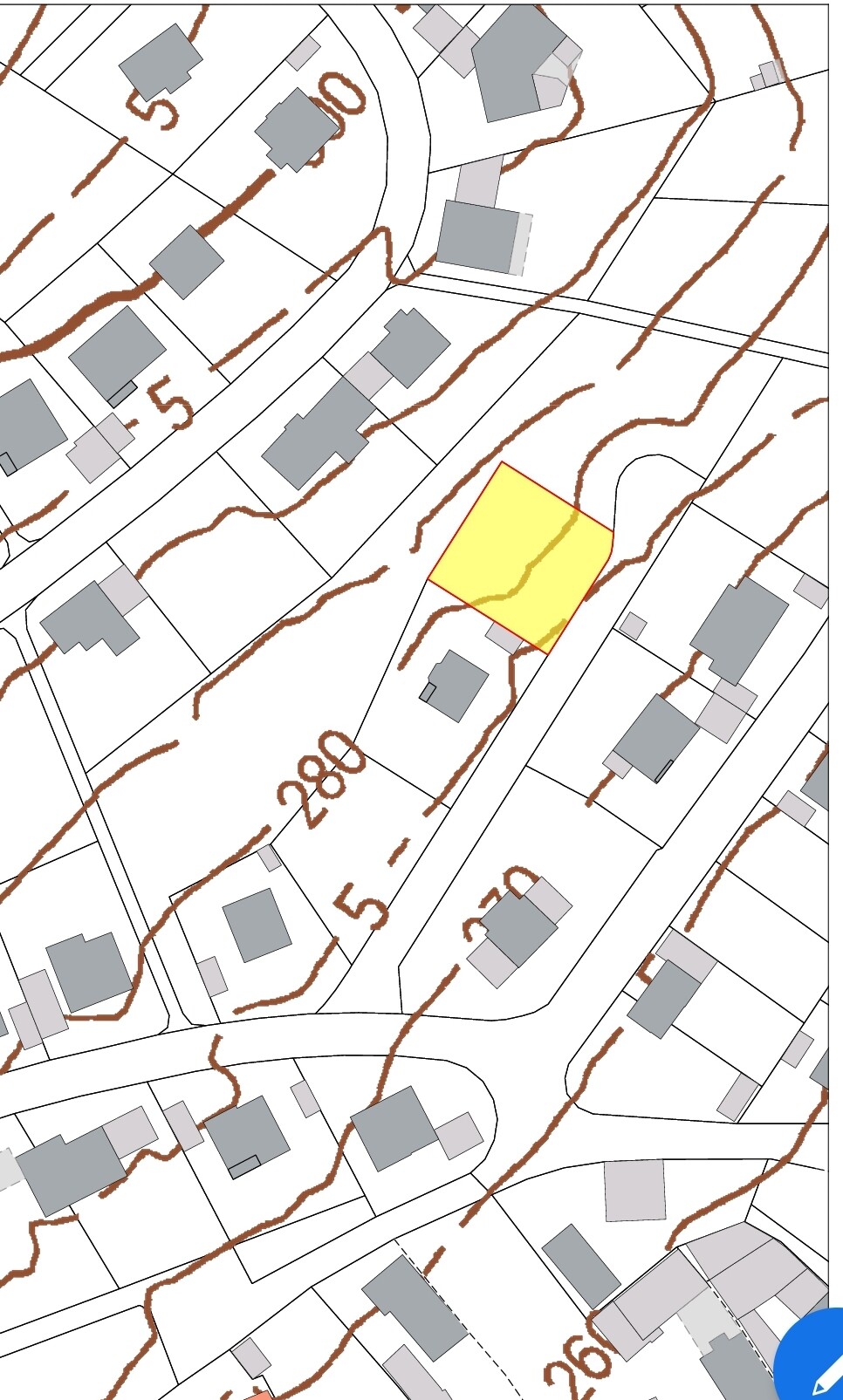 Yellow highlighted plot with red border on a site plan showing houses and contour lines.