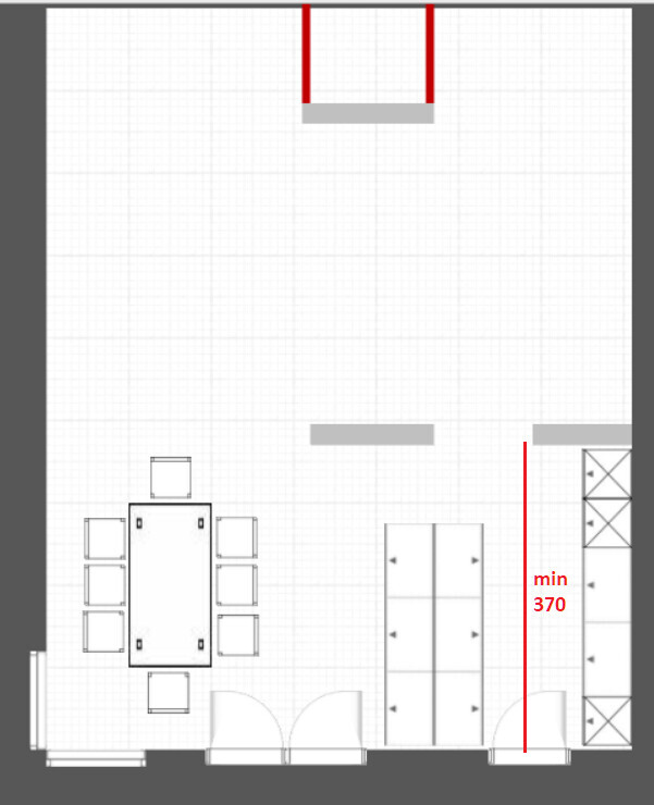 Floor plan of a room with dining table on the left, kitchen units on the right, doors, red clearance mark min 370.