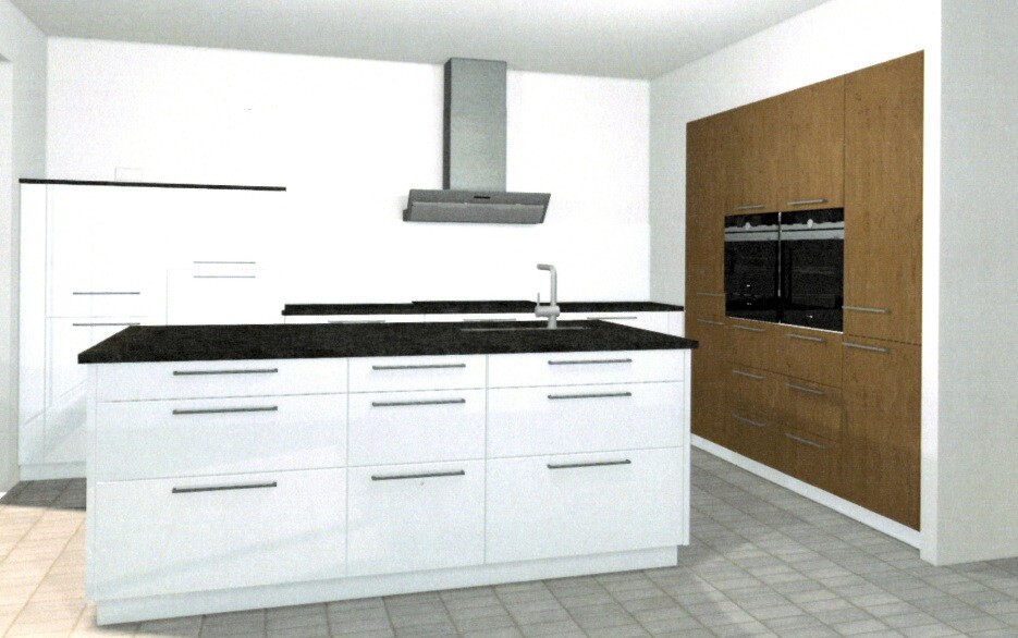 Modern kitchen with white island, black countertops, stainless steel faucet, and ovens in wood cabinet wall.