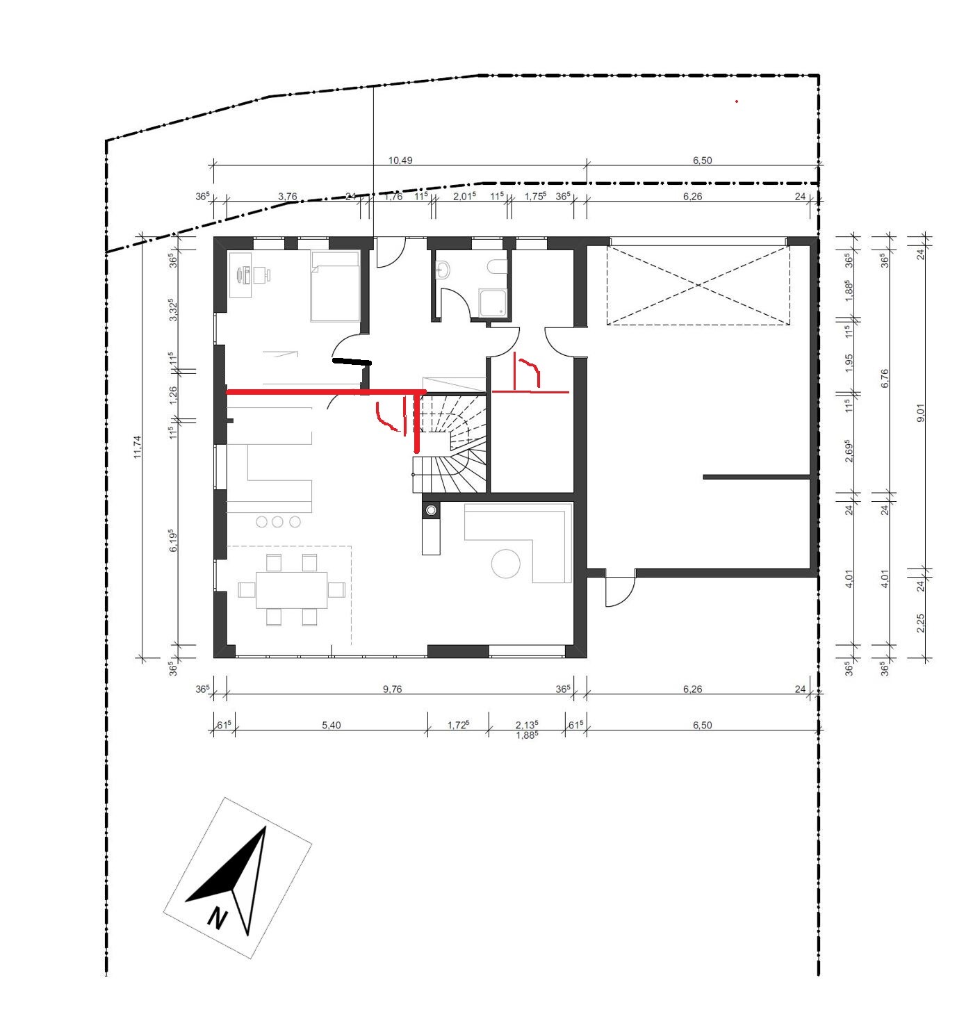 Floor plan of a residential house with kitchen, dining area, living room, stairs, bathroom, bedroom, and garage.