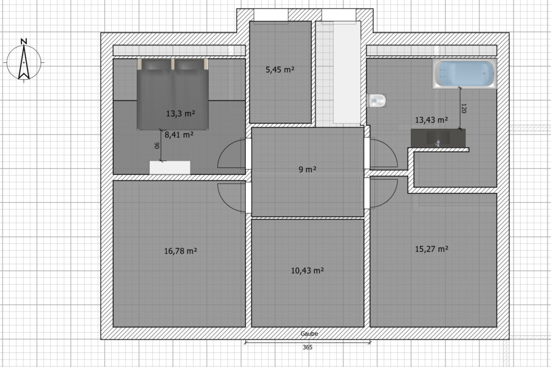 Floor plan of a house with several rooms, dimensions in m² (bedroom, bathroom, hallways).
